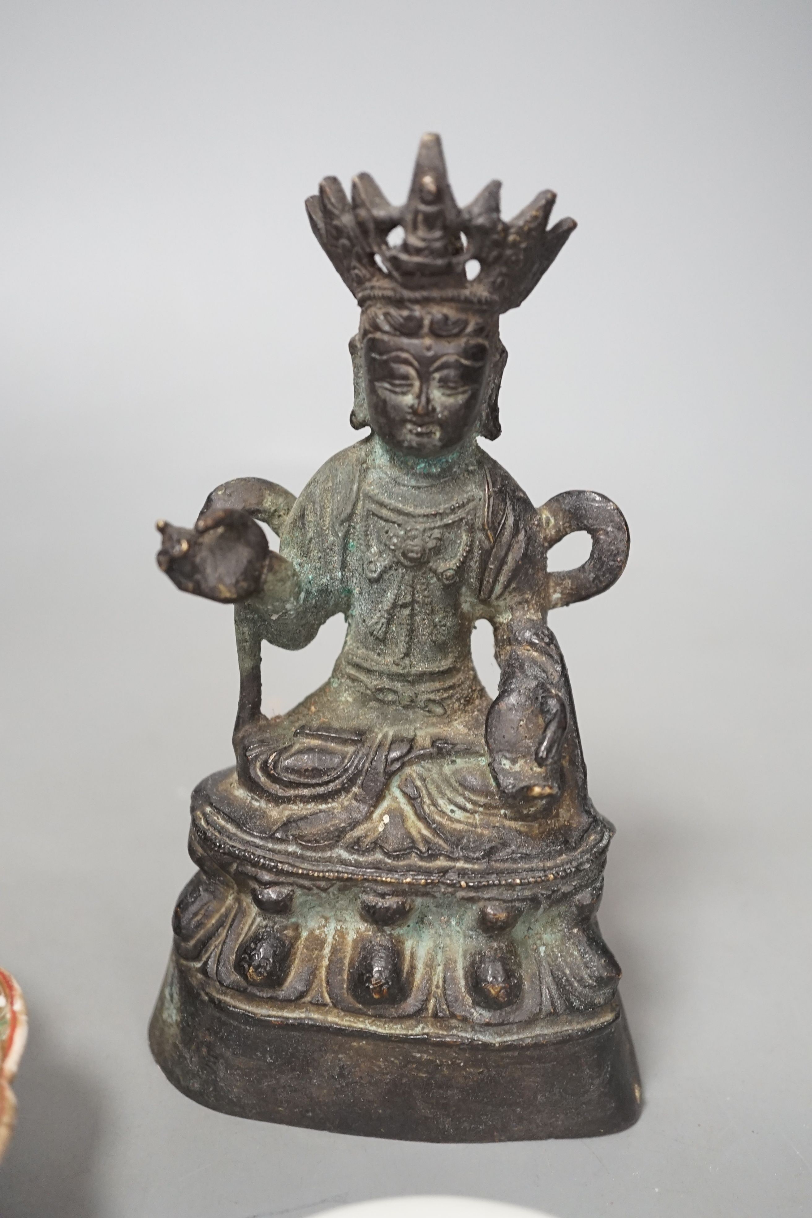 A Chinese famille verte porcelain jar cover, similar famille rose dish and a bronze figure of a Bodhisattva, tallest 16cm